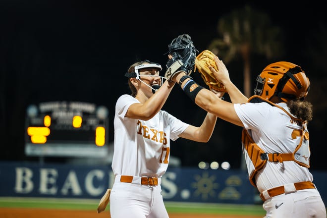 Texas pitcher Teagan Kavan, left, celebrates with catcher Reese Atwood during the Longhorns' 9-2 win over Stanford on Feb. 16 in a Clearwater, Fla., tournament. Kavan, a freshman, has become the Longhorns' top pitcher and leads the team in innings pitched, wins, appearances, starts and complete games.